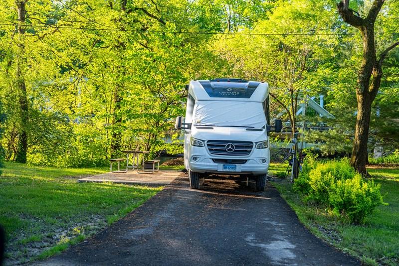 RV arriving at campground daytime