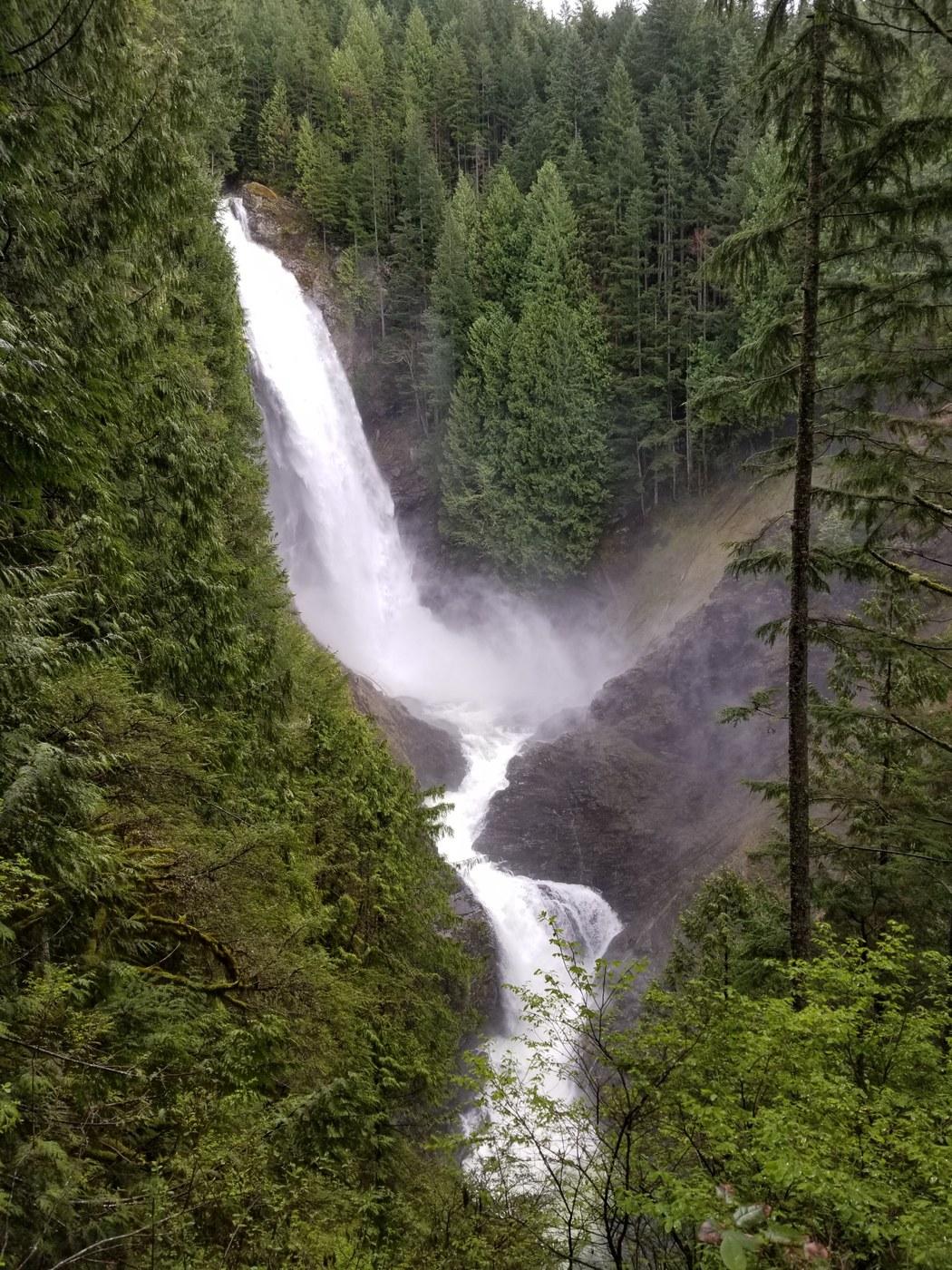Franklin Falls surrounded by snowy forest landscape