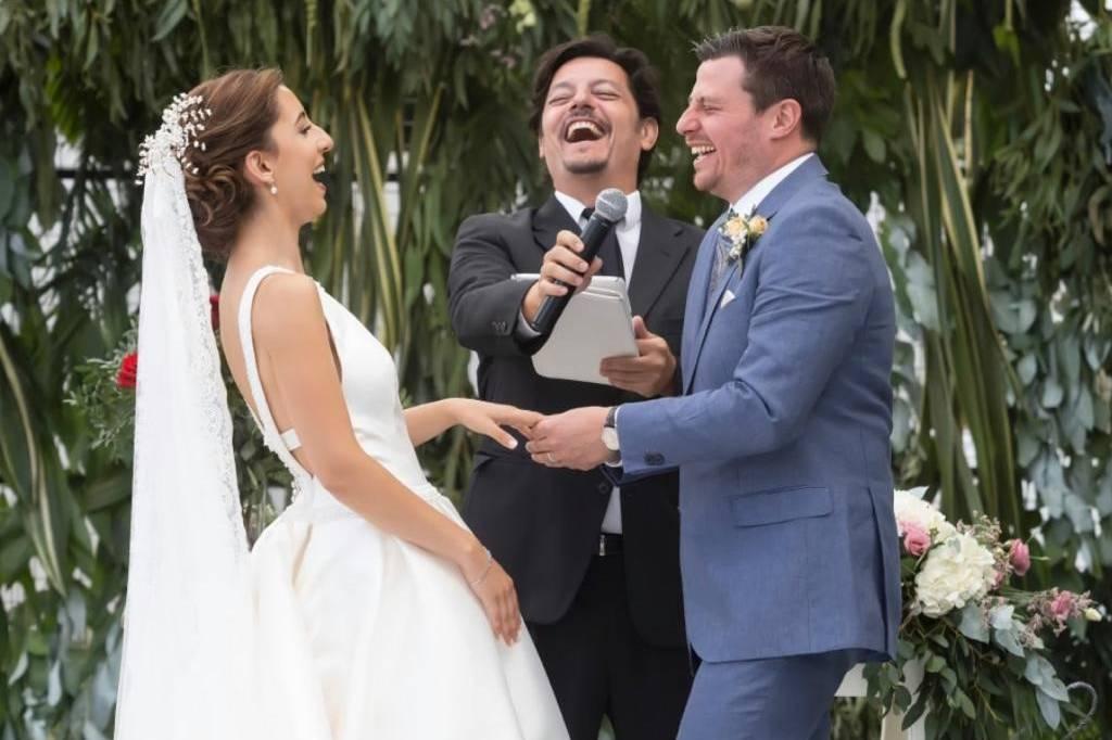Happy couple laughing at wedding