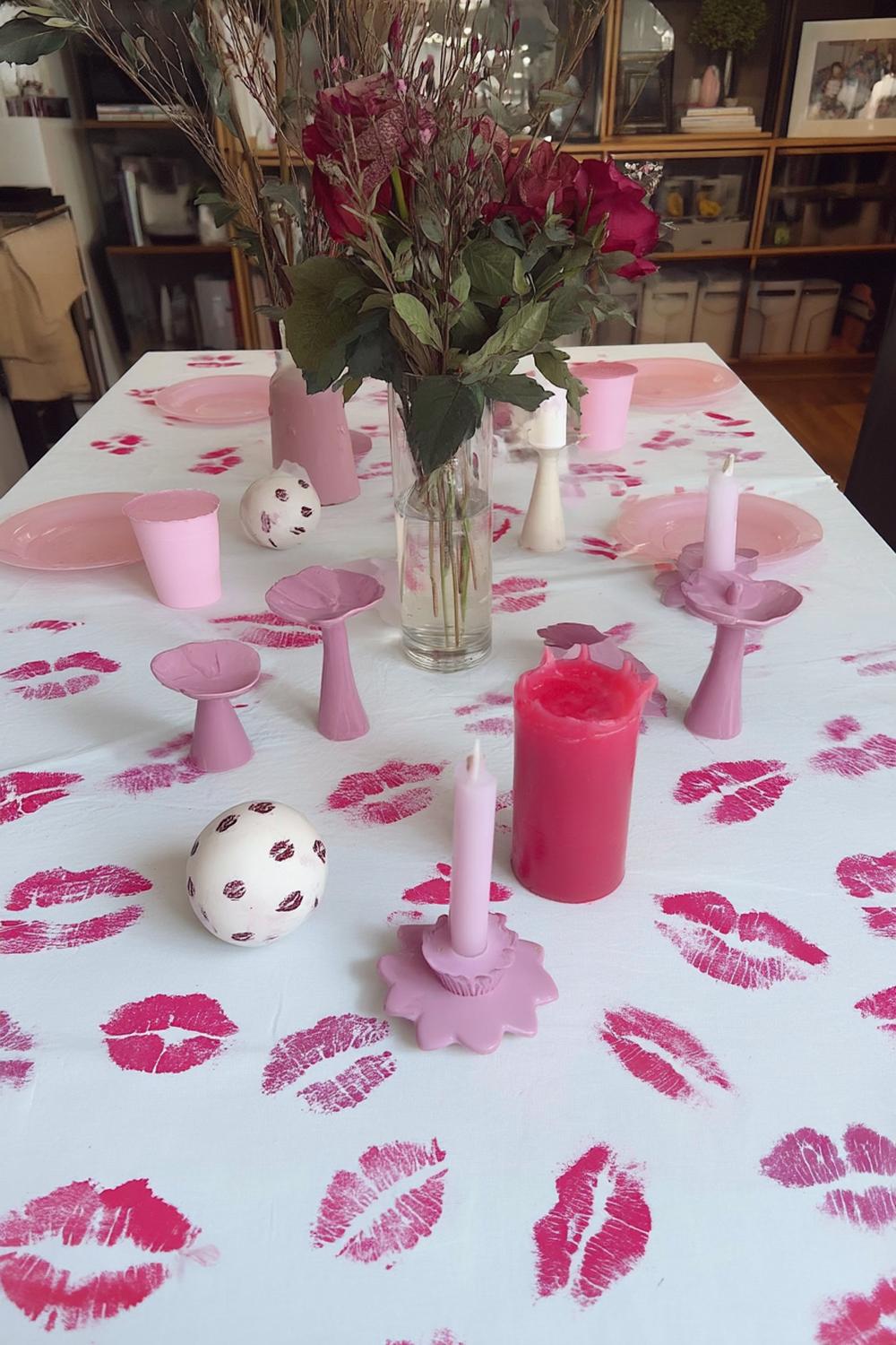 22. Low Rose-and-Candle Center Line for galentines party decor table ideas
