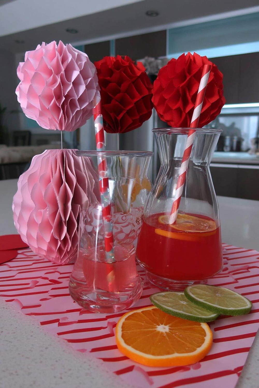 37. Pink Mocktail Station with Citrus Slices for galentines party decor food ideas