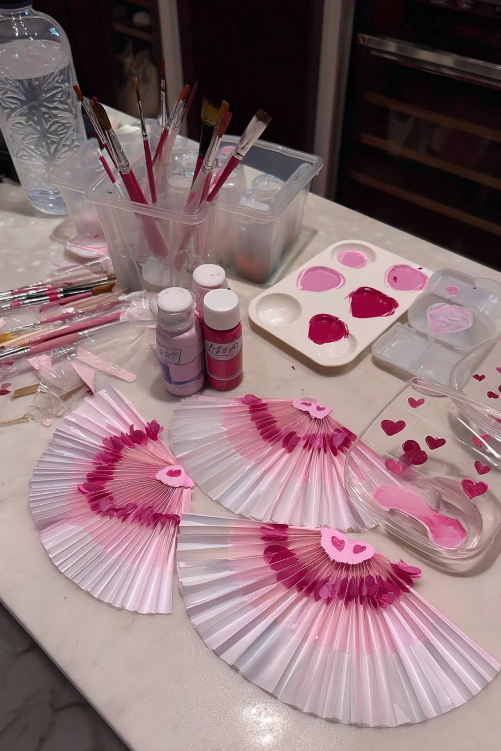 4. Statement Backdrop of Layered Paper Fans for galentines party decor ideas ideas