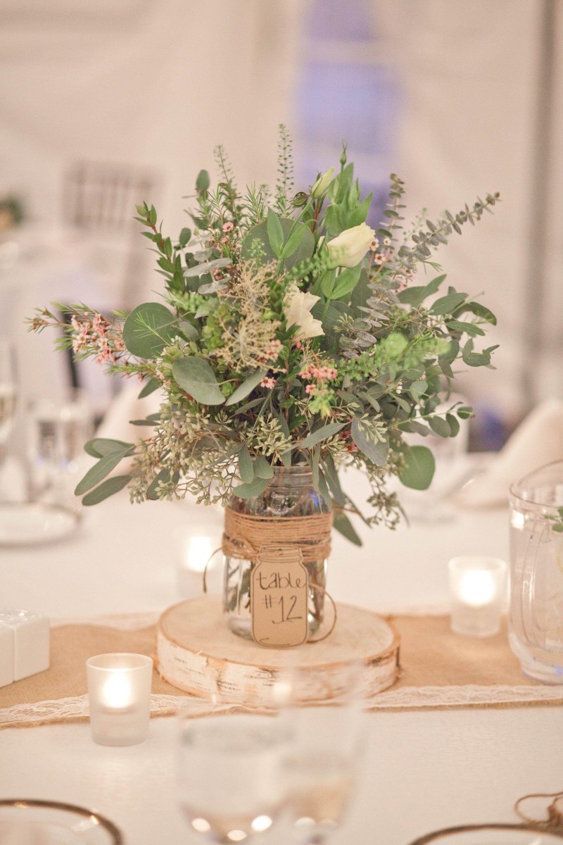 Greenery mason jar table arrangement
