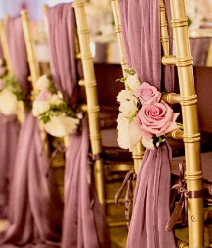 Modern wedding reception decorations with illuminated stage
