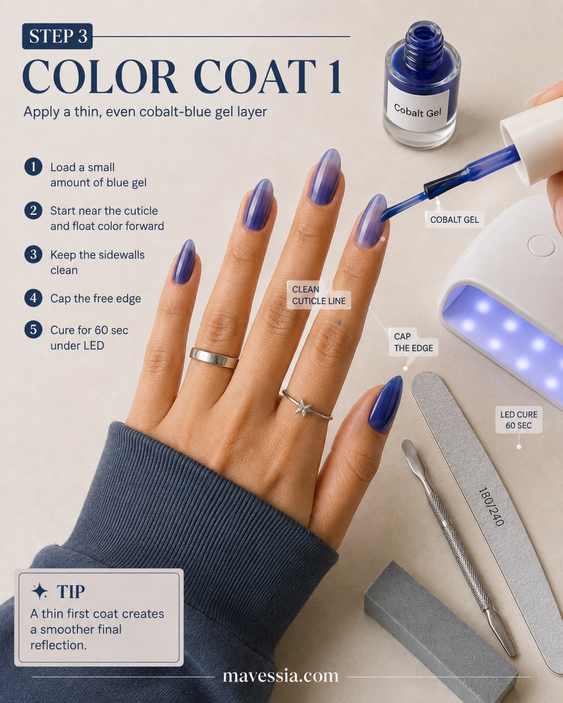 First thin cobalt gel coat being brushed on for navy blue chrome almond nails