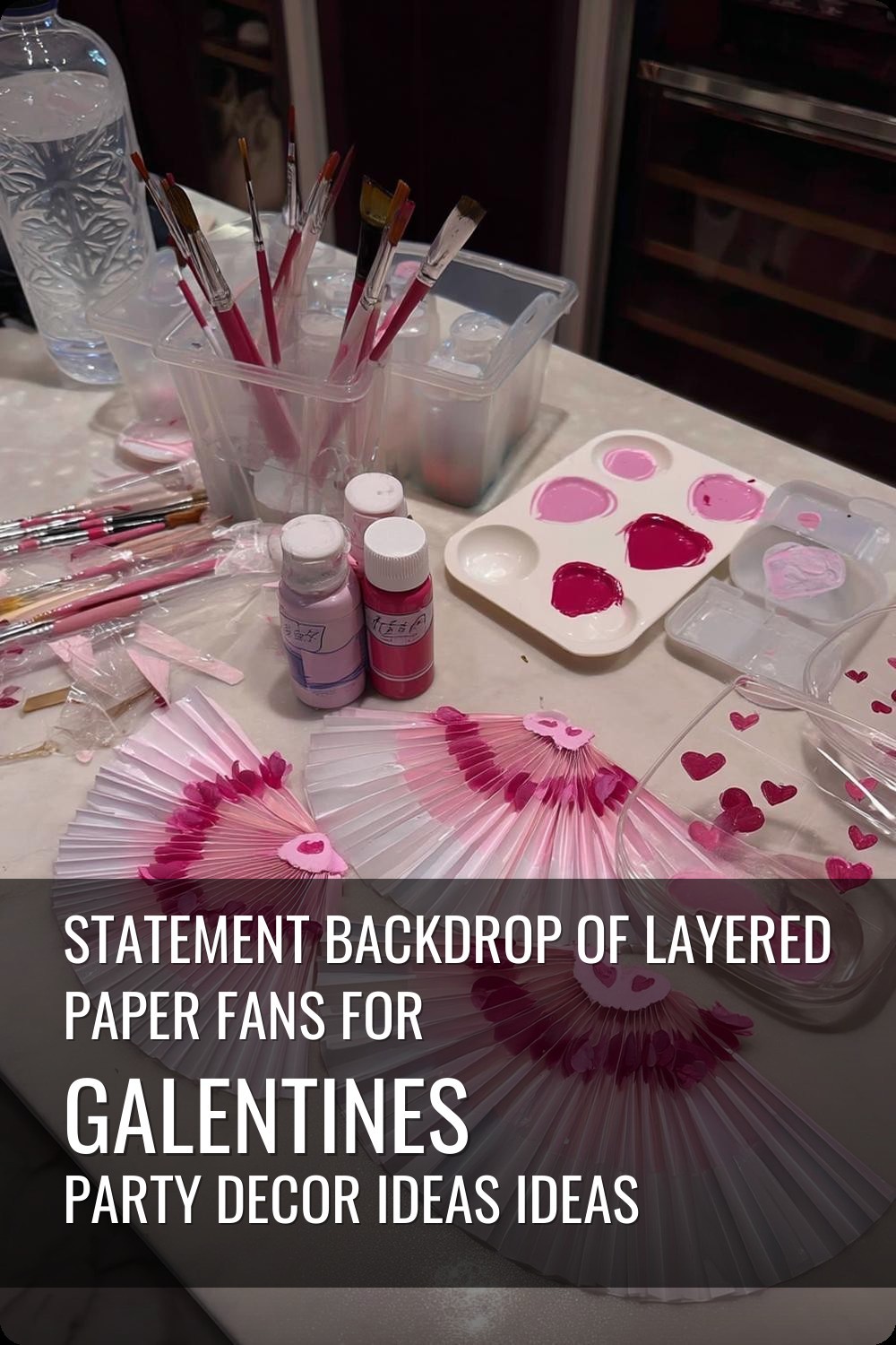Statement Backdrop of Layered Paper Fans for galentines party decor ideas ideas