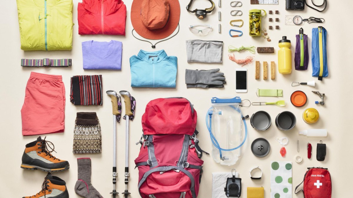 Organized hiking backpack gear layout