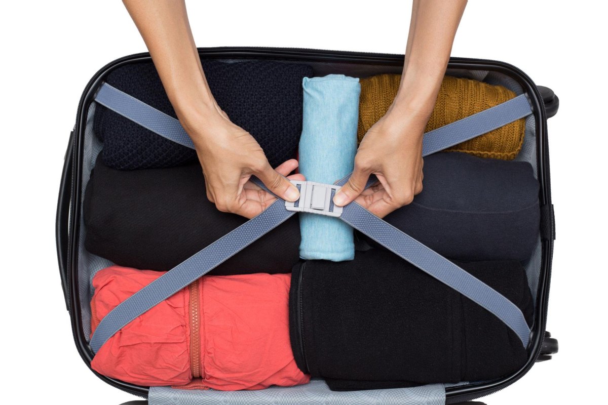 Belts around suitcase edge