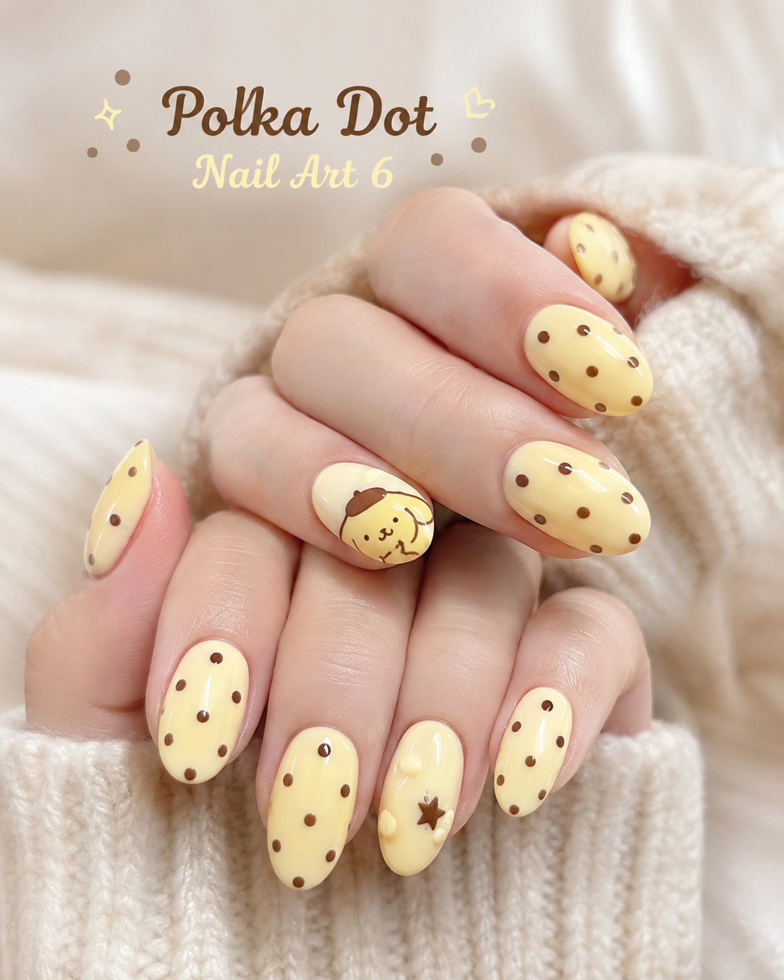 Yellow polka dot nail art with brown dots and a hand-painted bear accent nail