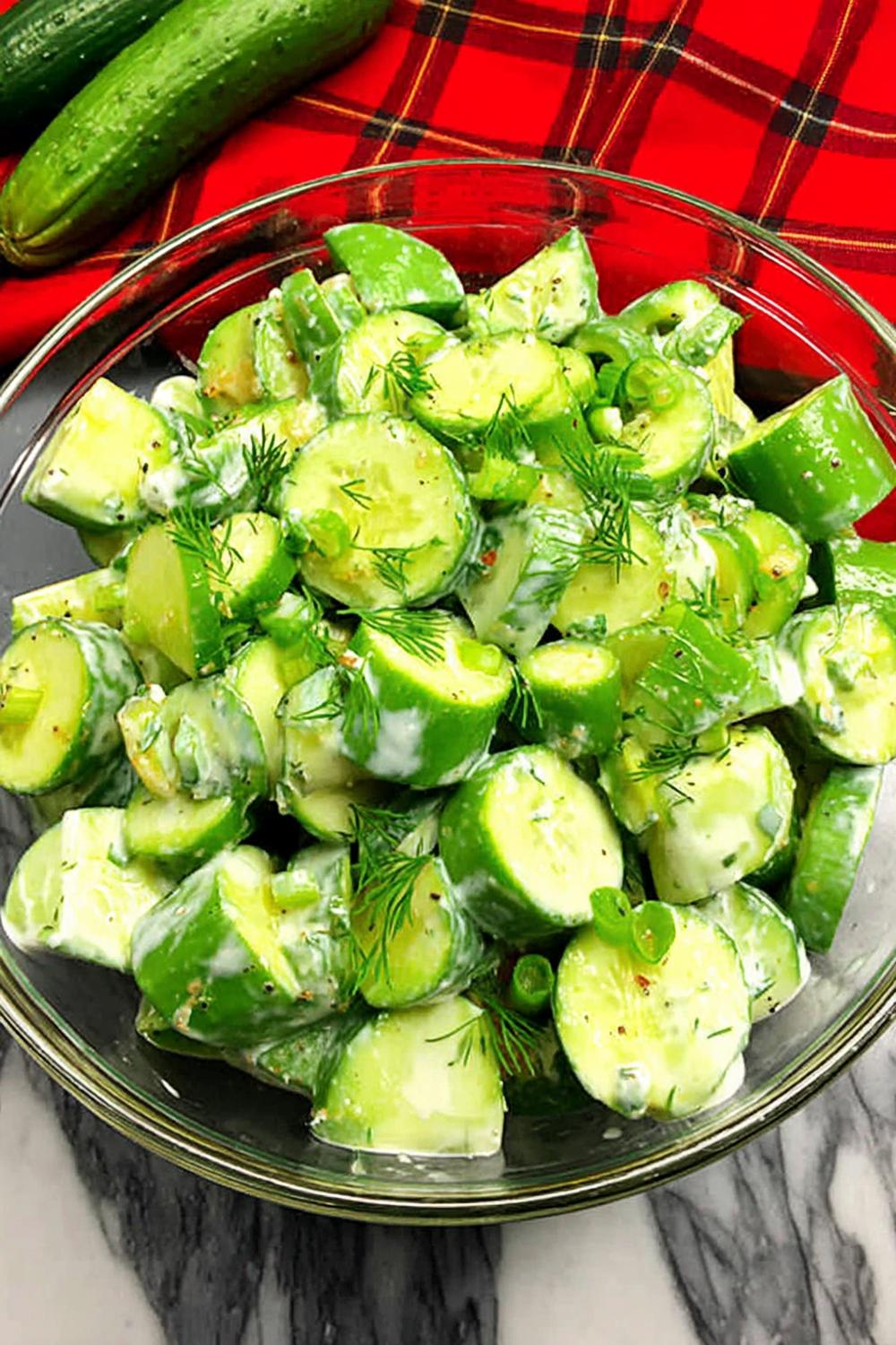 6. Creamy Yogurt and Dill Cucumber Salad Recipes in a Glass Bowl