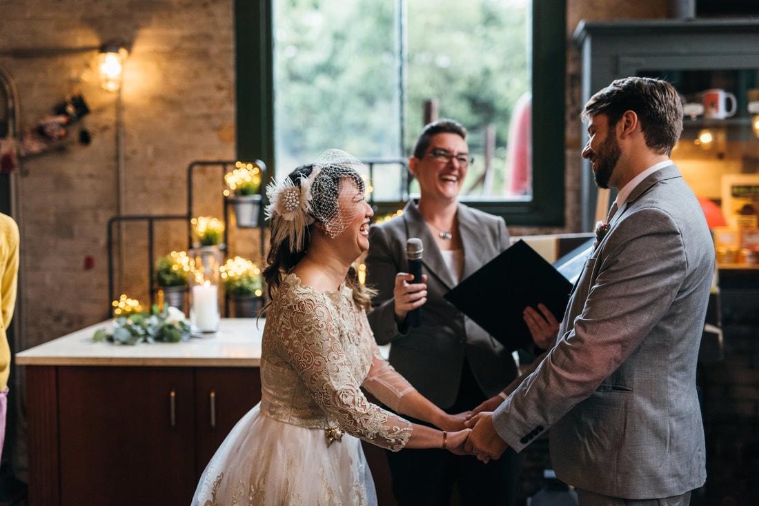 Couple smiling during wedding ceremony