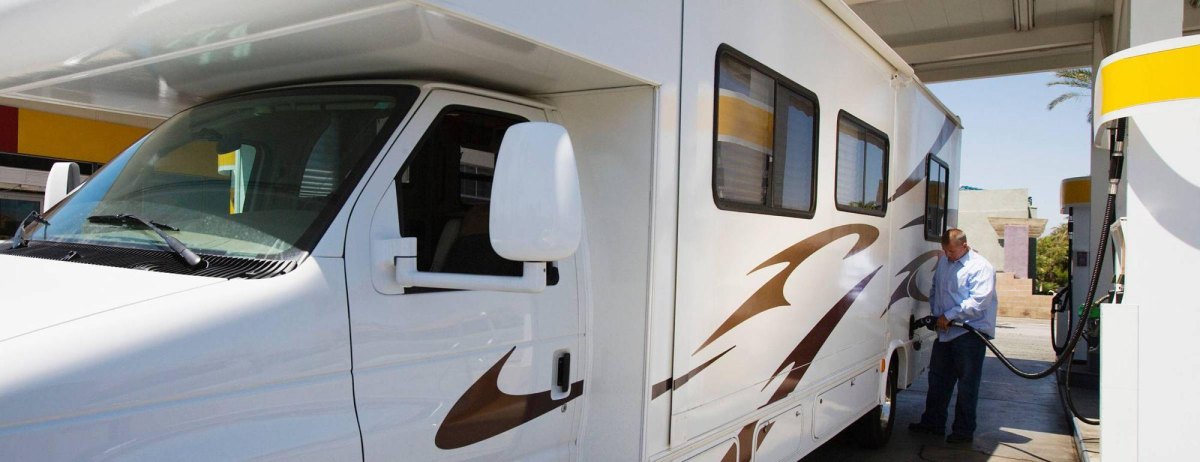 RV fueling stop showing practical travel cost planning