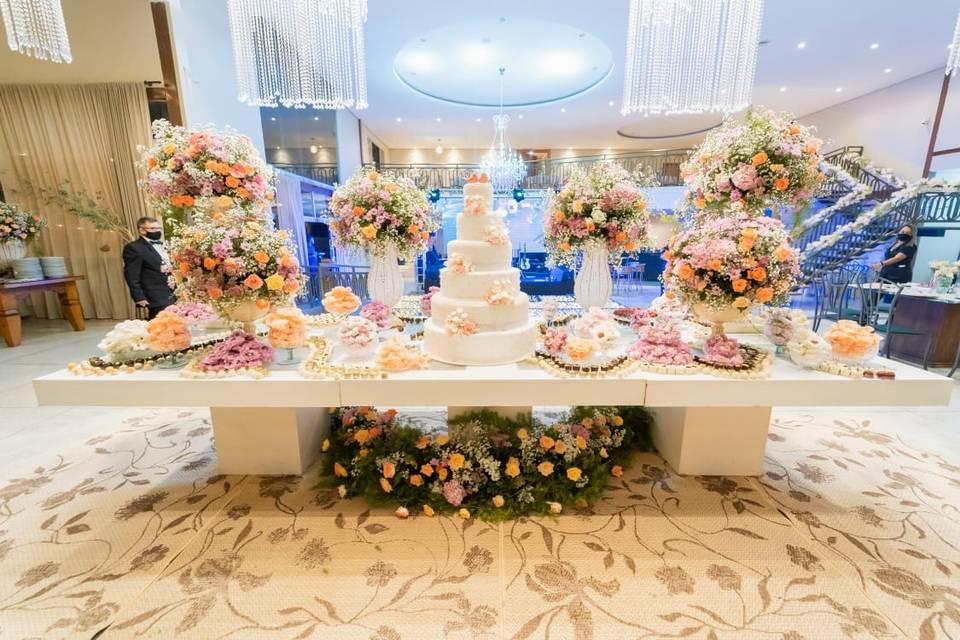 Wooden wedding reception decorations with floral centerpiece